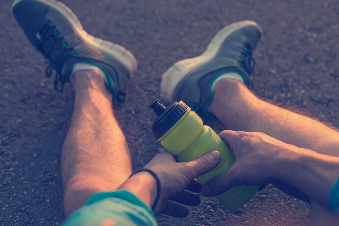 The man holding holding sport water