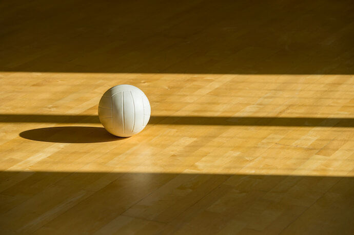 bola de volei com piso dew madeira