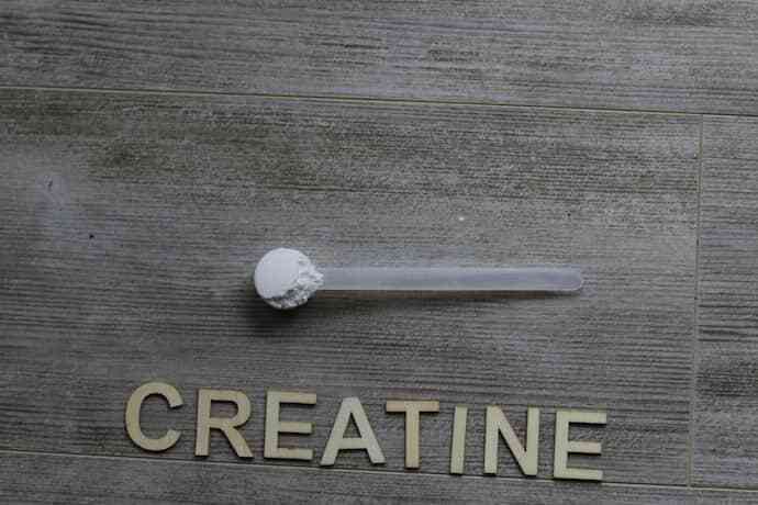 Creatine escrito e pó de creatina