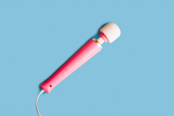 Vibrador rosa no meio